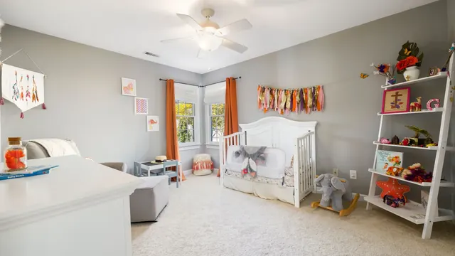 Custom nursery built-ins with a changing station and low-reach shelving in a Lexington KY home